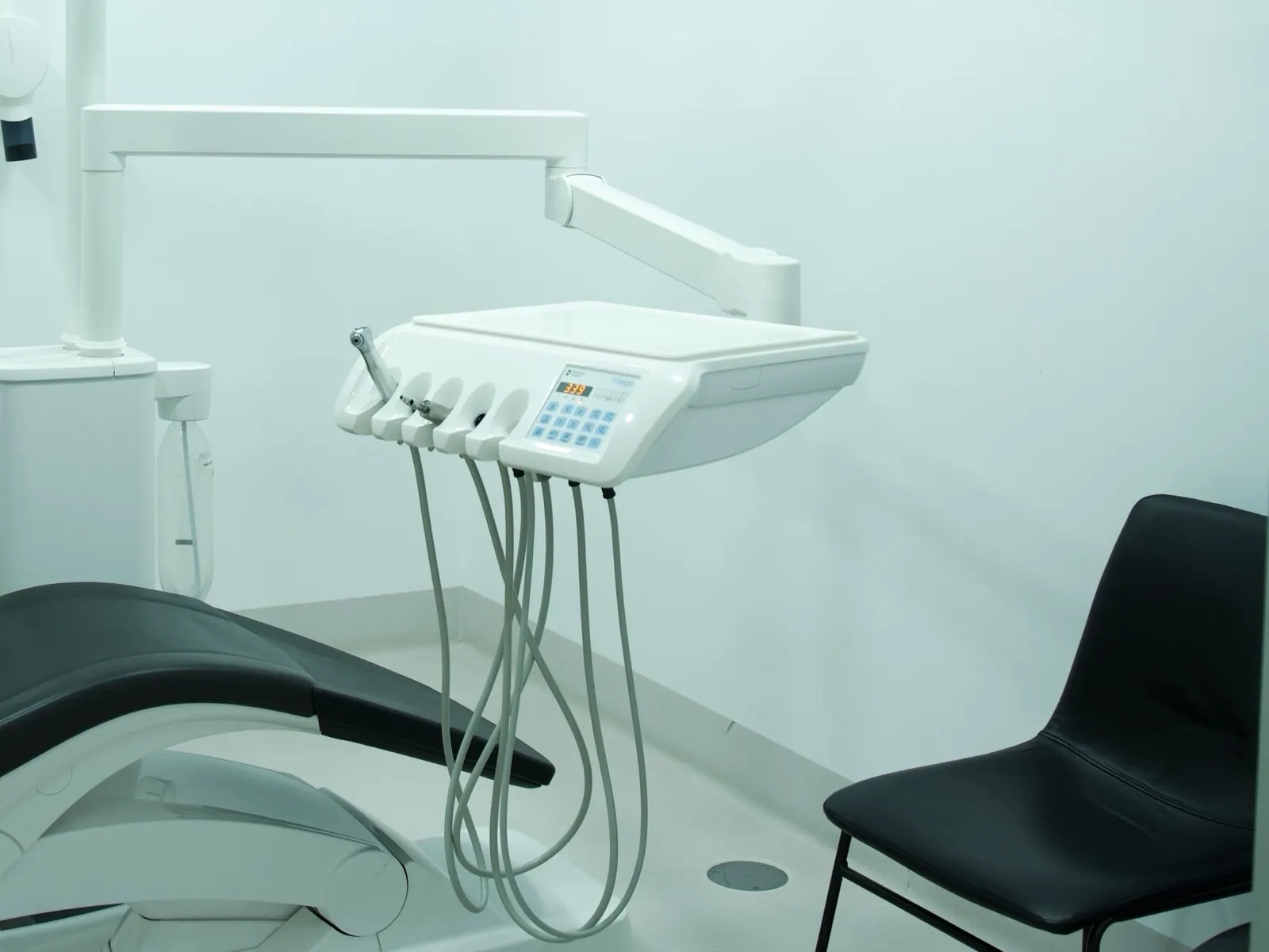 A dental chair in one of the clinic's treatment rooms